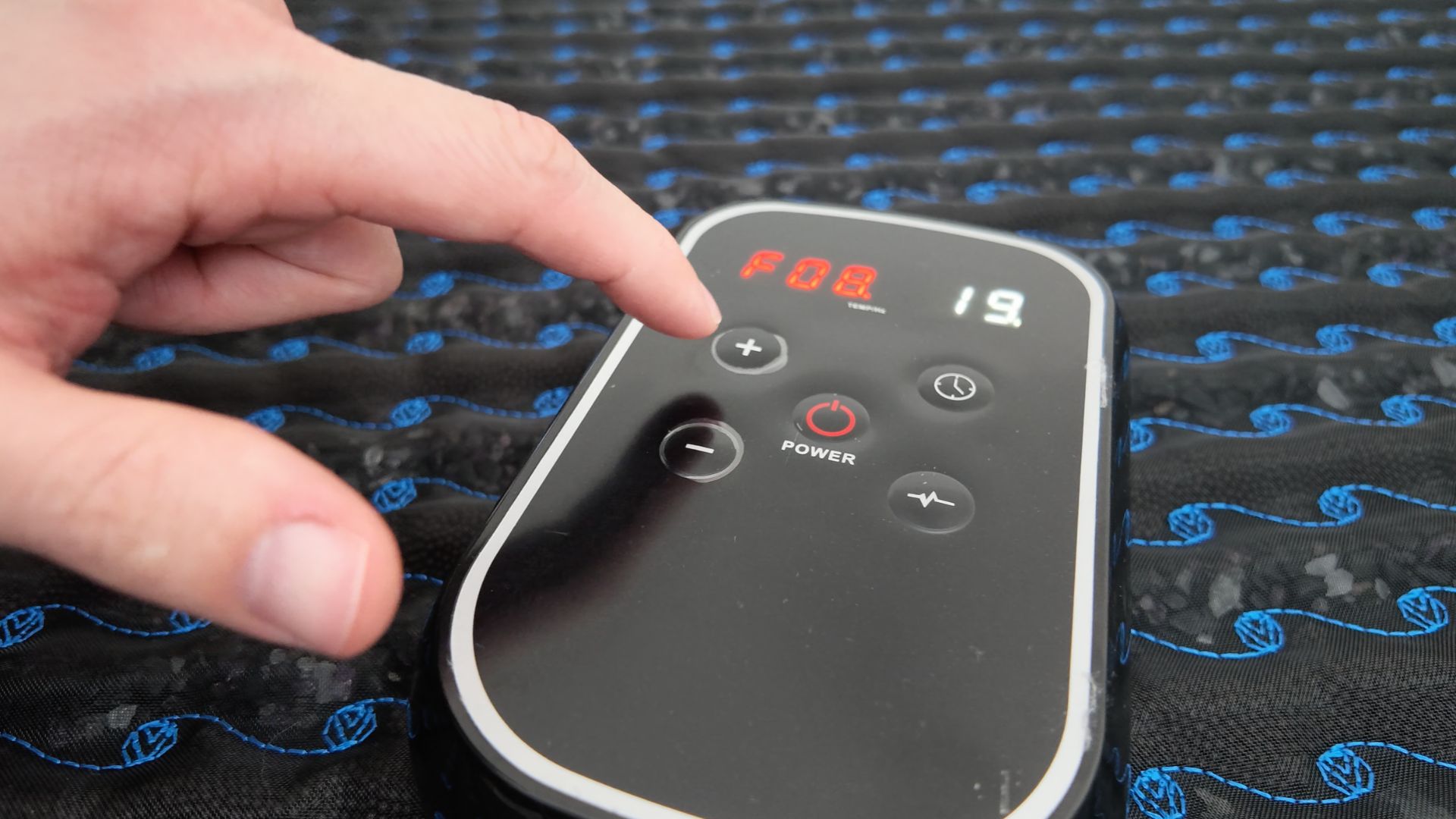 Adjusting frequency and heat settings on the digital PEMF controller