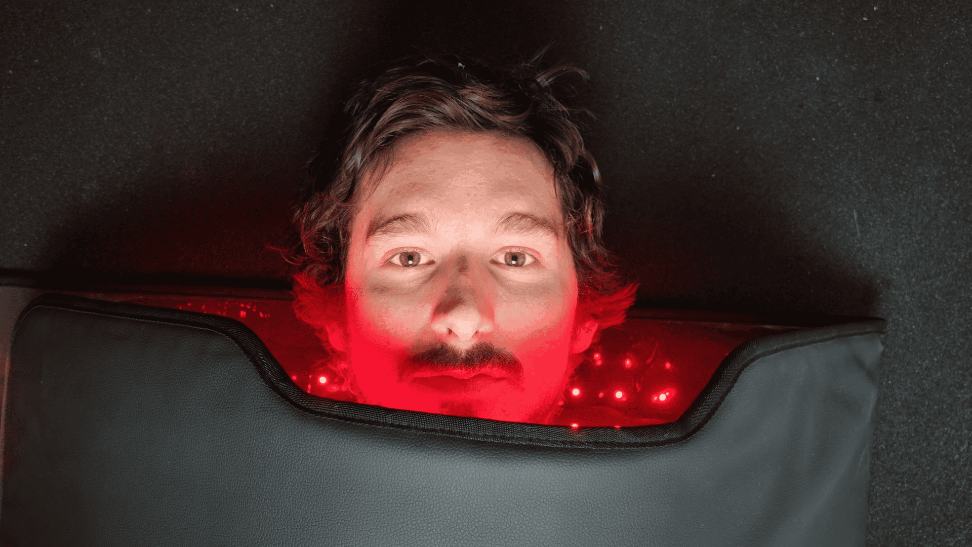 Garage Biohacker resting comfortably inside the red light blanket after 6 months of daily use